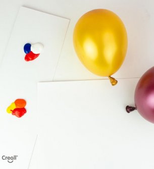 Christmas baubles painted with balloon technique